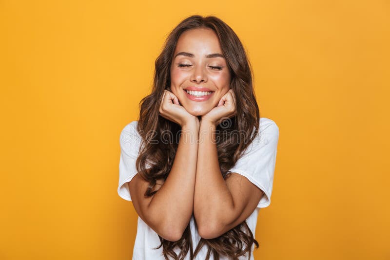 Image of positive young woman 20s with long hair laughing and pr stock images Image of positive young woman 20s with long hair laughing and pr stock images