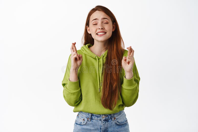 Image Of Redhead Girl Feeling Hopeful Cross Fingers And Wishing Biting Lip And Close Eyes