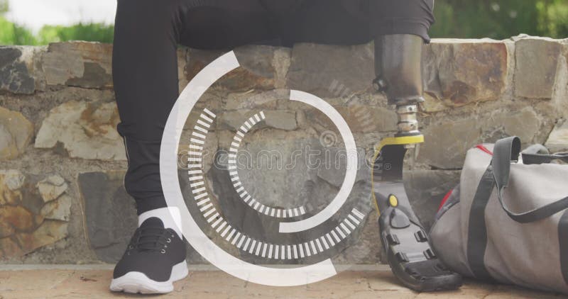 Image of rotating circular scanner over male athlete with prosthetic leg using smartphone stock image
