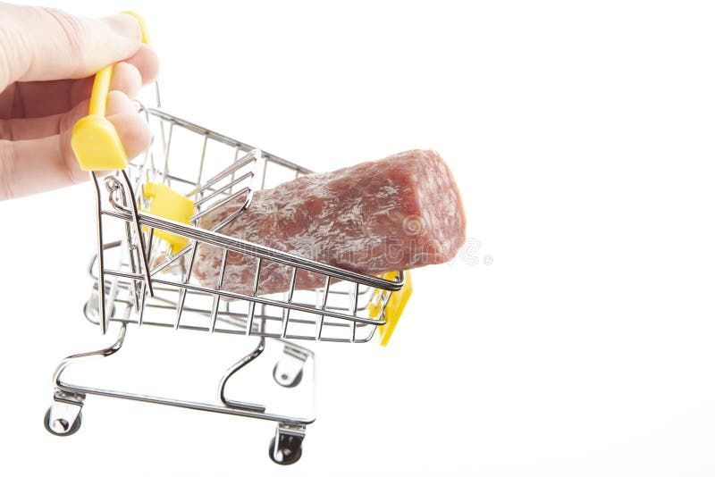 Image of sausage trolley hand white background royalty free stock image