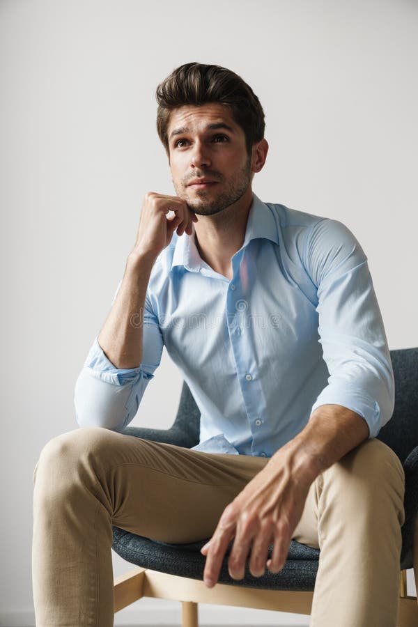 Man Sitting on the Chair Thinking Deeply Stock Photo - Image of sitting ...