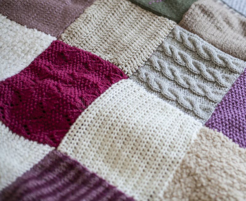 Knitted Blanket Patchwork of Colours and Patterns Stock Image