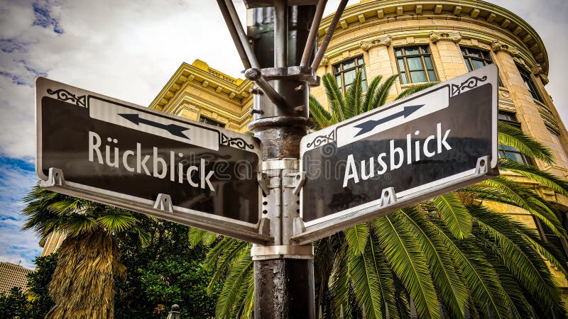 An image with a signpost pointing in two different directions in German. One direction points to outlook, the other points to backsight. An image with a signpost pointing in two different directions in German. One direction points to outlook, the other points to backsight