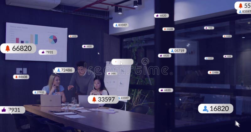 Image of social media icons with numbers over diverse colleagues discussing work in office stock photography