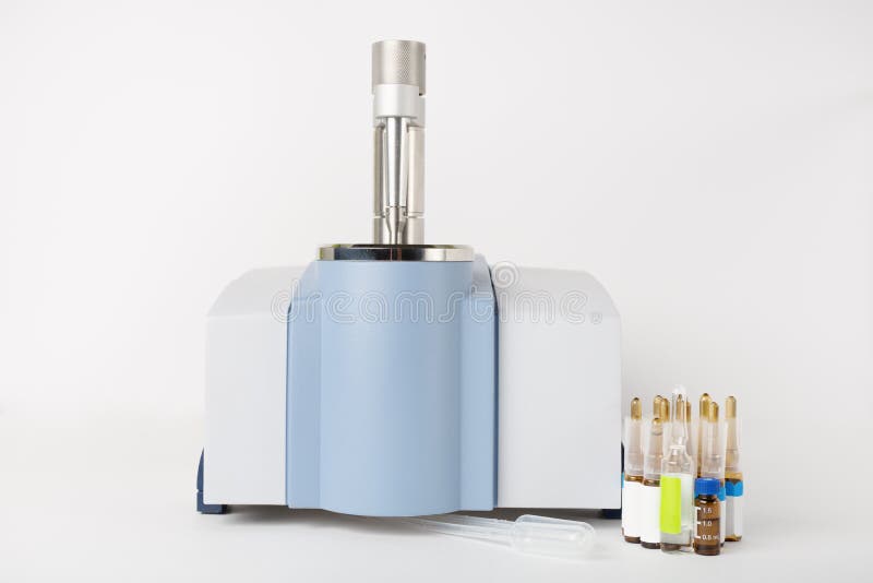 Image of Spectrometer for Chemical Analysis and Vials on a Whit Stock