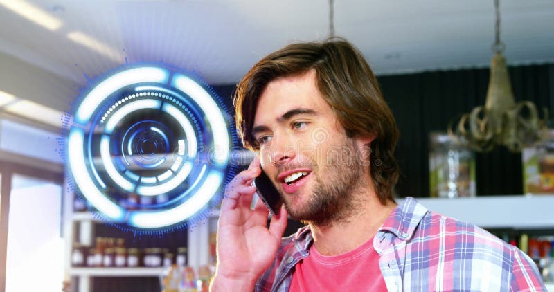 Image of spinning round scanner over portrait of caucasian talking on smartphone at a cafe royalty free stock photography