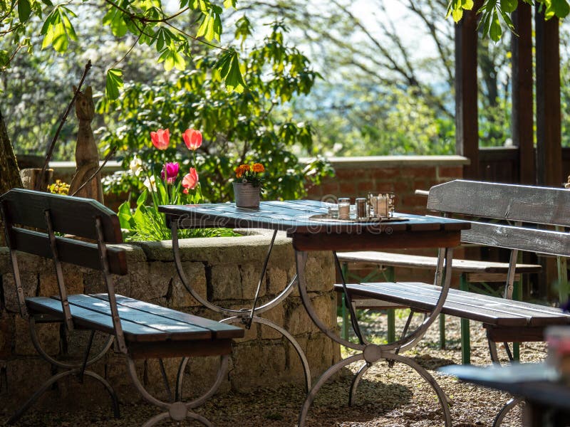 Image of traditional bavarian beergarden tables and chairs