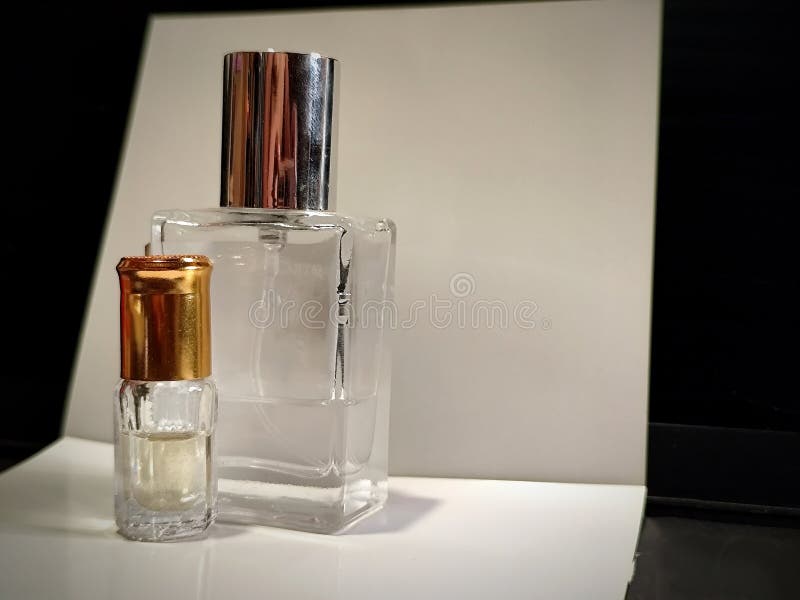Image of two transparent perfume bottles stock photos