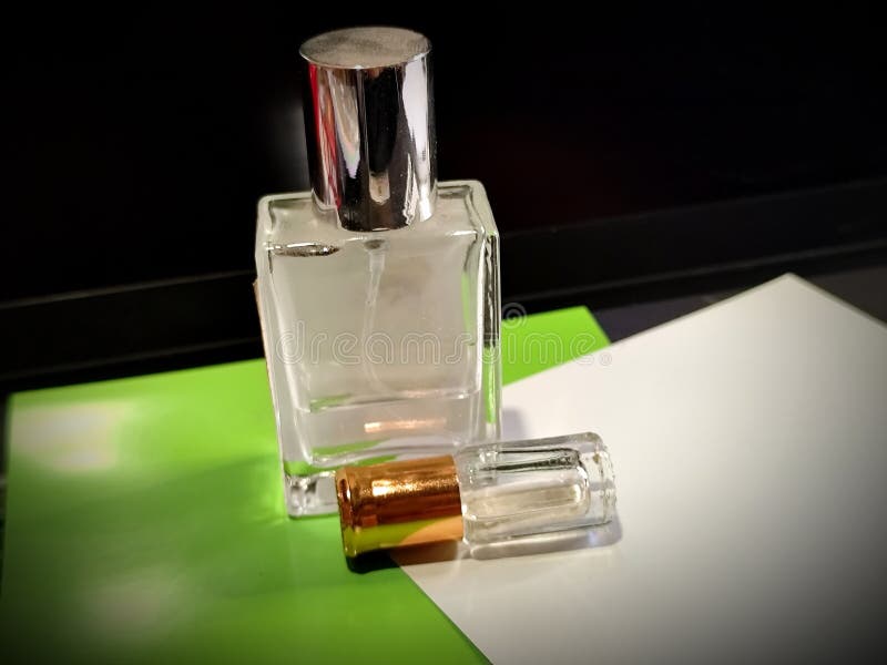 Image of two transparent perfume bottles stock photos