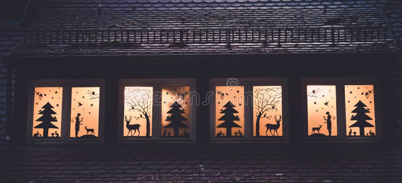 Image of window decoration with forrest fairy tale silhouettes