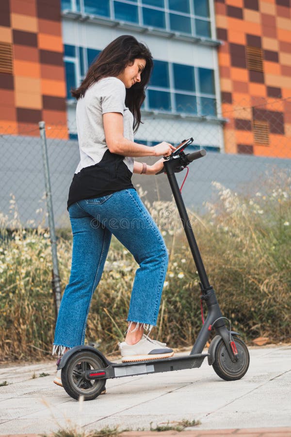 Image of a Woman on an Electric Scooter Stock Photo Image of active