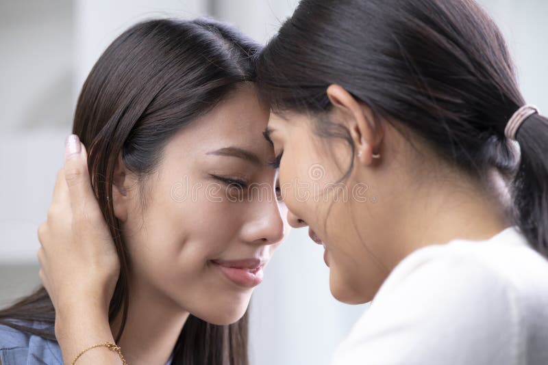 Image Of Young Pleased Lesbian Asian Women With Closed Eyes Touching