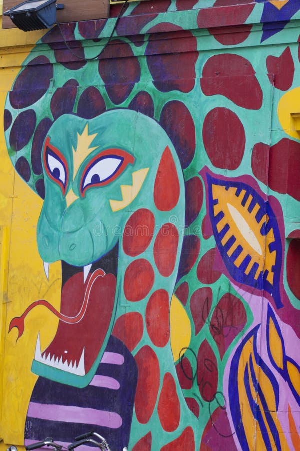 Imagem colorida dos grafittis em uma parede ilustração royalty free Imagem colorida dos grafittis em uma parede ilustração royalty free