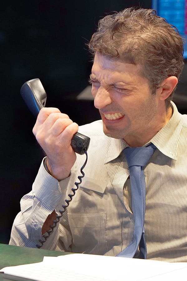 Imagem composta do homem de negócios forçada para fora no trabalho fotografia de stock royalty free Imagem composta do homem de negócios forçada para fora no trabalho fotografia de stock royalty free