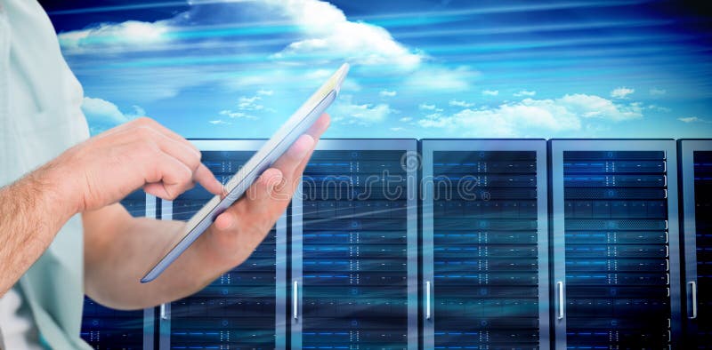 Imagem composta do homem que usa o PC da tabuleta imagem de stock Imagem composta do homem que usa o PC da tabuleta imagem de stock