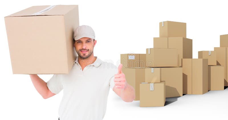 Delivery man with cardboard box gesturing thumbs up against cardboard boxes over white background. Delivery man with cardboard box gesturing thumbs up against cardboard boxes over white background