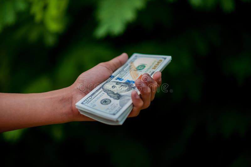 Good financial condition financial loop increase in income Hand and dollar pictures Concept of business finance. Good financial condition financial loop increase in income Hand and dollar pictures Concept of business finance