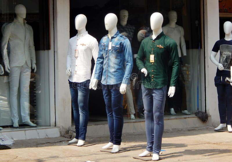 IMannequins in front of a clothes retail shop