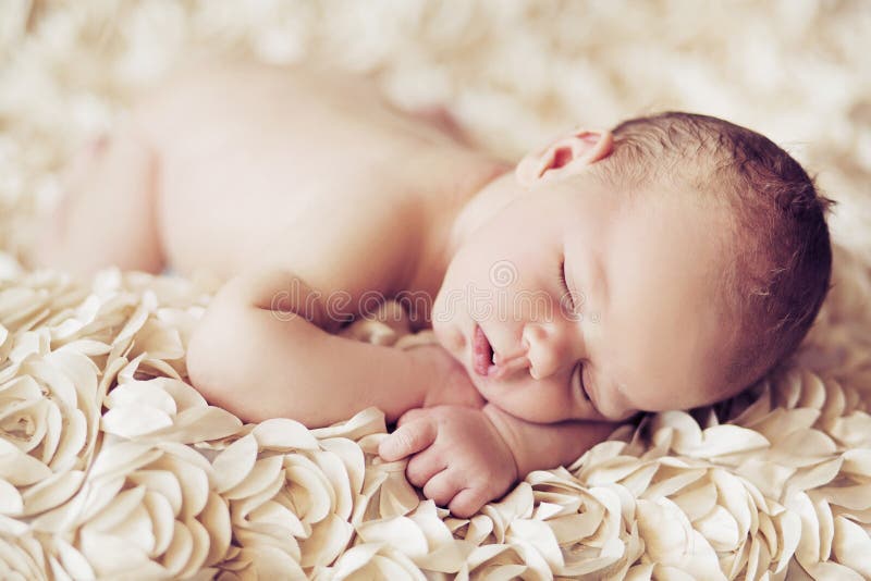 Immagine che presenta bambino addormentato sveglio fotografie stock Immagine che presenta bambino addormentato sveglio fotografie stock