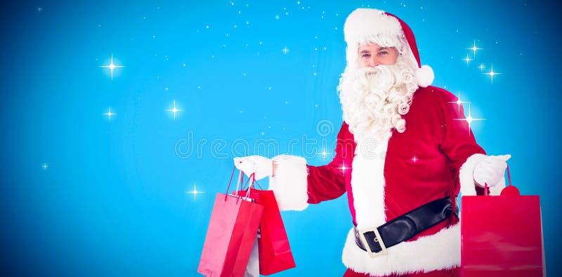 Immagine composita dei sacchetti della spesa sorridenti della tenuta del Babbo Natale immagini stock libere da diritti Immagine composita dei sacchetti della spesa sorridenti della tenuta del Babbo Natale immagini stock libere da diritti