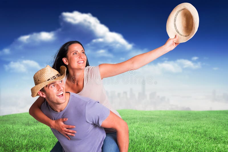 Immagine composita dell'uomo che dà alla sua amica graziosa un a due vie immagini stock libere da diritti Immagine composita dell'uomo che dà alla sua amica graziosa un a due vie immagini stock libere da diritti