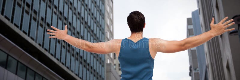 Immagine composita dell'uomo con il fondo bianco controllante steso di armi immagine stock Immagine composita dell'uomo con il fondo bianco controllante steso di armi immagine stock