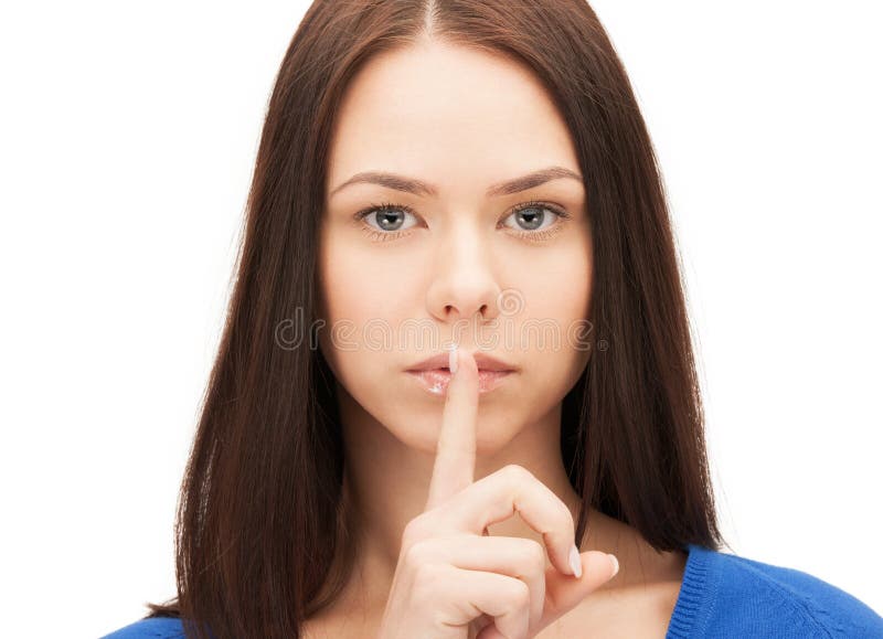 Immagine della donna con il dito sulle labbra fotografia stock Immagine della donna con il dito sulle labbra fotografia stock