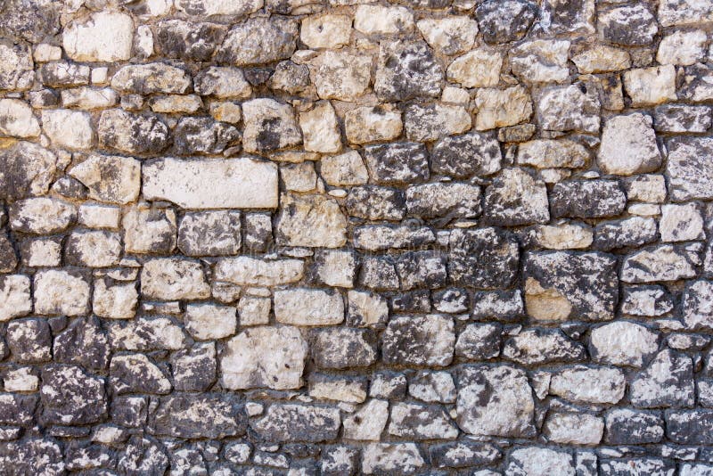 Immagine di colore - struttura della parete di pietra fotografia stock