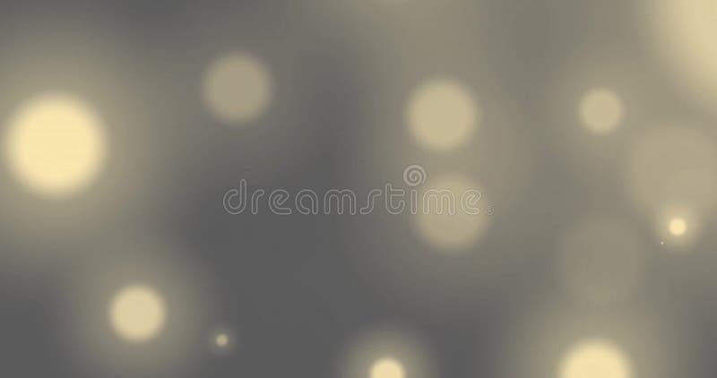 Immagine di macchie luminose sullo sfondo grigio. Concetto per il colore della luce e il movimento delle immagini generate in digitale.