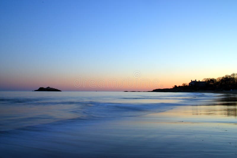 Immagine di riserva del tramonto della spiaggia di canto fotografie stock libere da diritti Immagine di riserva del tramonto della spiaggia di canto fotografie stock libere da diritti