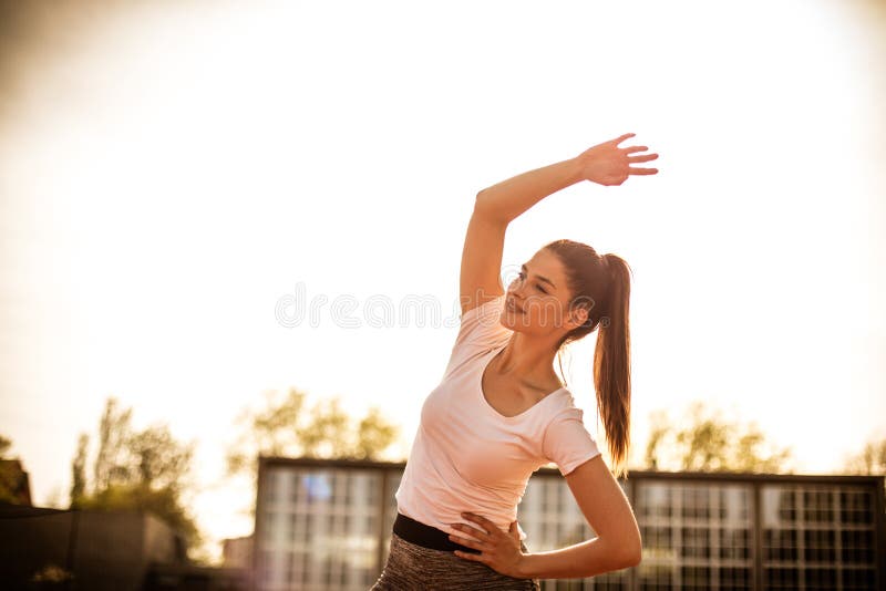 Important part of exercise is stretching. Close up image. stock photos Important part of exercise is stretching. Close up image. stock photos
