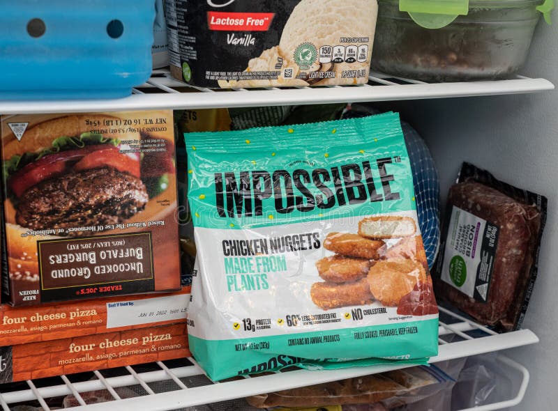 Impossible plant based chicken nuggets package in freezer stock photos