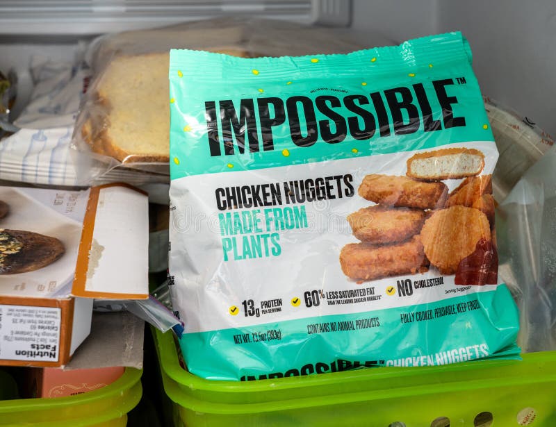 Impossible plant based chicken nuggets package in freezer royalty free stock photography