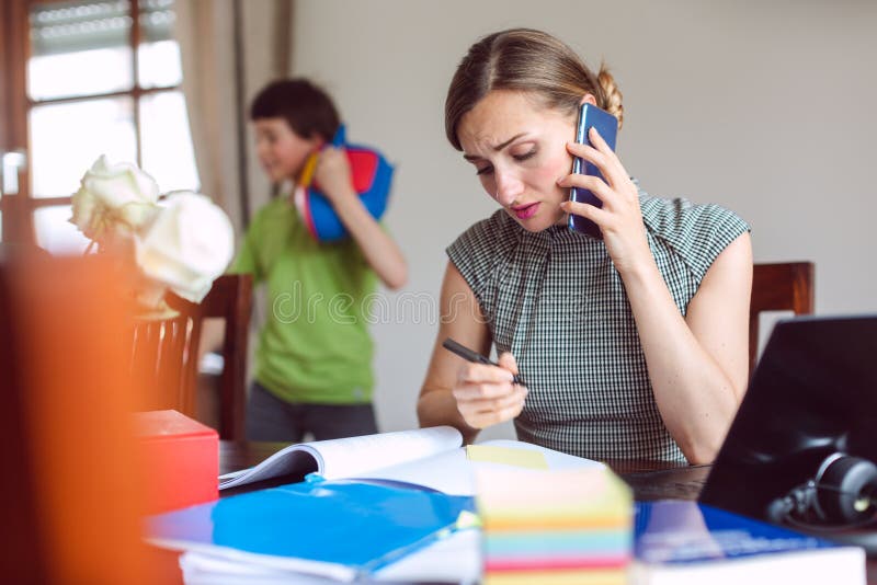 Stressed Businesswoman forced to work from home during lockdown cannot concentrate on work. Stressed Businesswoman forced to work from home during lockdown cannot concentrate on work