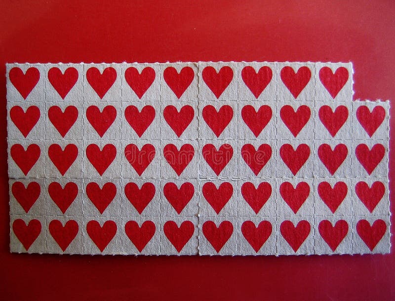 Impresiones finas del pequeño del palillo de los papeles papel pintado macro rojo del fondo imagen de archivo libre de regalías Impresiones finas del pequeño del palillo de los papeles papel pintado macro rojo del fondo imagen de archivo libre de regalías