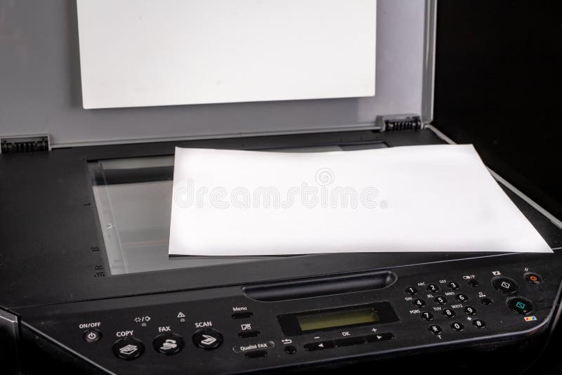 Printer with the option of copying on a dark table. Multifunction device intended for home use. Black background, business, computer, copier, desk, desktop, digital, equipment, fax, ink, laser, machine, modern, object, office, output, page, paper, pc, photo, scanner, technology, white, work. Printer with the option of copying on a dark table. Multifunction device intended for home use. Black background, business, computer, copier, desk, desktop, digital, equipment, fax, ink, laser, machine, modern, object, office, output, page, paper, pc, photo, scanner, technology, white, work