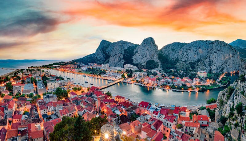 Impressive summer sunset in Omis city. Fantastic evening seascape of Adriatic sea, Dalmatia coast, Croatia, Europe. Beautiful