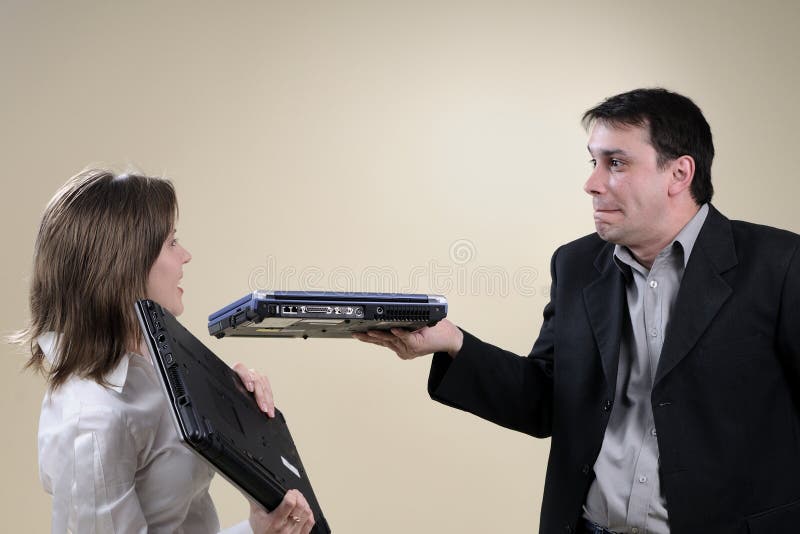 Impulsive woman and man fighting with notebooks