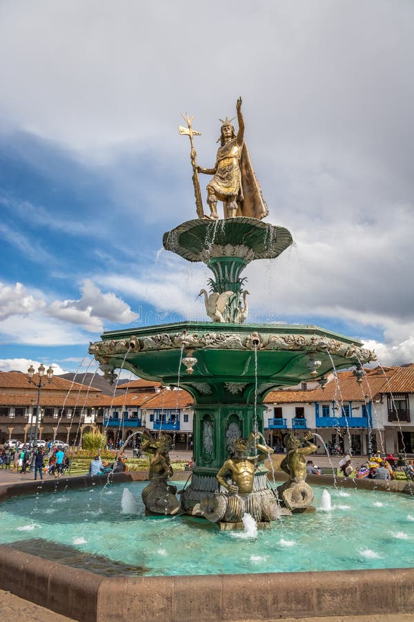 Inca Fountain and Iglesia De La Compania De Jesus Church at Plaza De