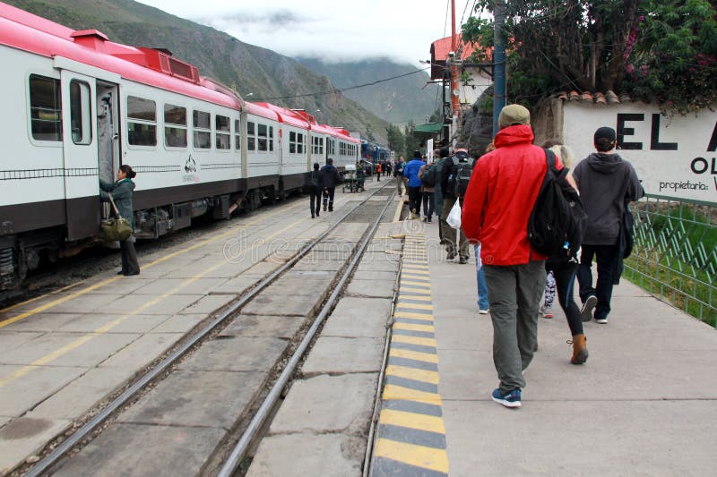 Inca Rail is a local railroad company providing service from Cusco to Machu Picchu with scenic views and meals royalty free stock photo