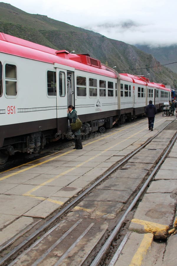 Inca Rail is a local railroad company providing service from Cusco to Machu Picchu with scenic views and meals royalty free stock photo