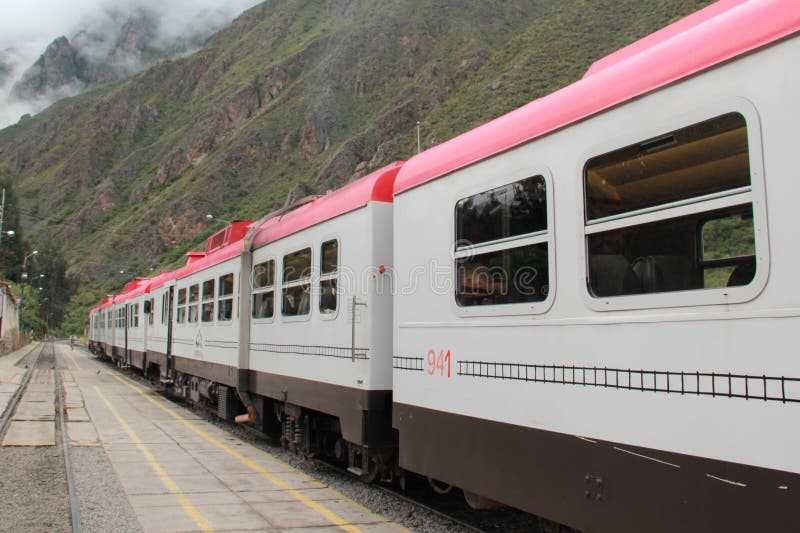 Inca Rail is a local railroad company providing service from Cusco to Machu Picchu with scenic views and meals royalty free stock images
