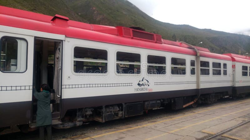 Inca Rail is a local railroad company providing service from Cusco to Machu Picchu with scenic views and meals royalty free stock image