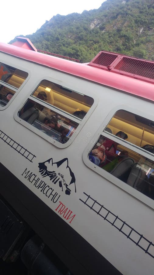 Inca Rail is a local railroad company providing service from Cusco to Machu Picchu with scenic views and meals stock photography