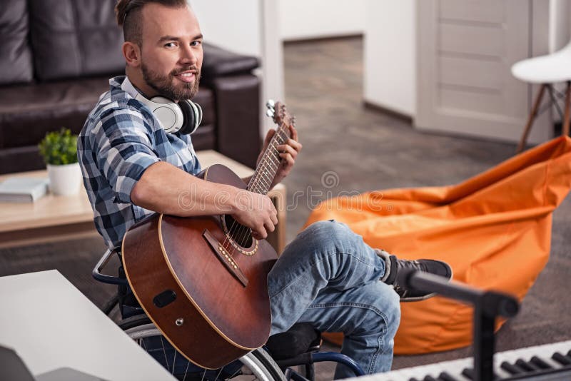Incapacitated Young Man Posing with His Guitar Stock Image - Image of ...