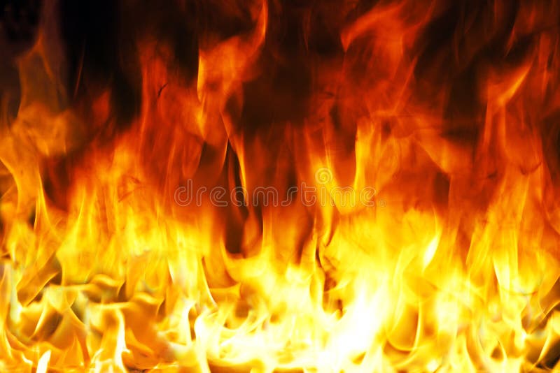 Fire and flames with a burning dark red-orange background. Fire and flames with a burning dark red-orange background.