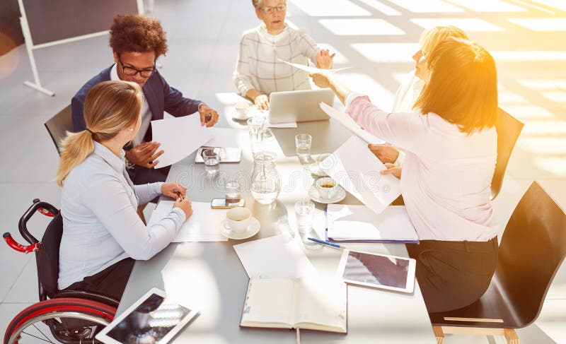 Inclusion at business people meeting in the office royalty free stock photo