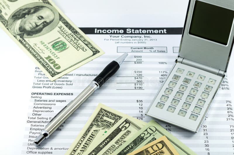 Income statement report with calculator, pen and usd money for b