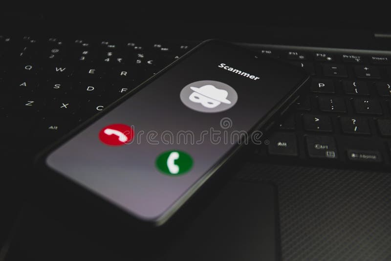 Incoming call from Scammer. Online scam on phone stock photography