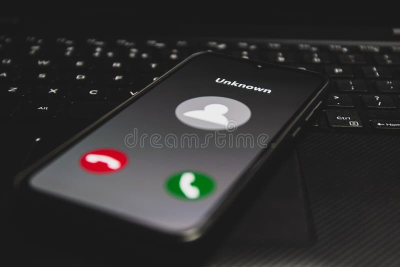 Incoming call from unknown number. Scam online on phone royalty free stock image